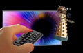 Doctor who tardis chase dalek through space television show remote control hand Royalty Free Stock Photo