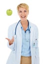 Doctor, woman and apple, healthcare and diet with nutritionist in studio, happiness and wellness on white background