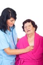 Doctor woman assessing elderly patient Royalty Free Stock Photo