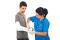 Doctor woman bandage injured hand man Royalty Free Stock Photo