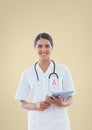 Doctor woman with breast cancer awareness ribbon Royalty Free Stock Photo