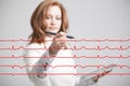 Doctor woman drawing cardiogram Royalty Free Stock Photo