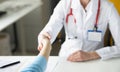 Doctor woman greet patient and shake hand, medical worker in uniform