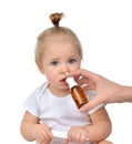 Doctor Woman hand using medicine nose spray nasal for baby toddler child kid Royalty Free Stock Photo