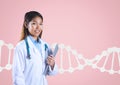 Doctor woman holding a folder against pink background with DNA strand Royalty Free Stock Photo