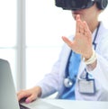 Doctor woman looking through phoropter during eye exam. Doctor woman Royalty Free Stock Photo