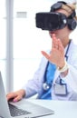 Doctor woman looking through phoropter during eye exam. Doctor woman Royalty Free Stock Photo