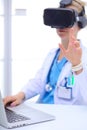 Doctor woman looking through phoropter during eye exam. Doctor woman Royalty Free Stock Photo