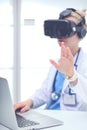 Doctor woman looking through phoropter during eye exam. Doctor woman Royalty Free Stock Photo