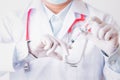 Doctor,woman,nurse, scientist hands in gloves holding syringe liquid vaccine