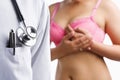 Doctor and woman on pink bra Royalty Free Stock Photo
