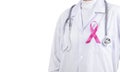 Doctor woman with pink ribbon on her chest, supporting symbol Royalty Free Stock Photo