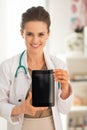 Doctor woman showing tablet pc blank screen Royalty Free Stock Photo