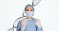 Doctor woman standing with 3D DNA strand Royalty Free Stock Photo