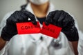 Doctor woman with surgical mask holding a blood test tube positive Coronavirus, isolated on gray background. Female nurse holding Royalty Free Stock Photo