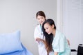 Doctor women support to her patients asian women in hospital,Healthcare concept Royalty Free Stock Photo