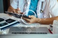 Doctor work on digital tablet healthcare doctor technology tablet using computer in a modern office Royalty Free Stock Photo