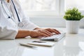 Doctor working with her computer in medical office Royalty Free Stock Photo