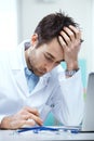 Doctor working at his desk