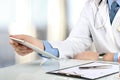Doctor working with tablet computer. Prescription on a table be Royalty Free Stock Photo