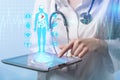 Doctor working on a virtual screen. medical technology concept Royalty Free Stock Photo