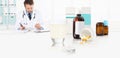 Doctor write the medical prescription on a desk office with glass aspirin tablets, pills and drugs bottles, cold and flu cure