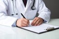 Doctor writing medical examination in medical clinic. AI generated