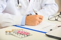 Doctor writing a perscription Royalty Free Stock Photo