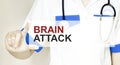 Doctor writing word BRAIN ATTACK with hands, Medical concept