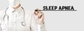 Doctor writing word SLEEP APNEA with marker, Medical concept Royalty Free Stock Photo