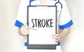 Doctor writing word Stroke with marker, Medical concept Royalty Free Stock Photo