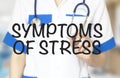 Doctor writing word symptoms of stress with marker, Medical concept Royalty Free Stock Photo