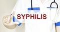 Doctor writing word SYPHILIS with hands, Medical concept