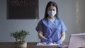 Doctor writting with a marker on a paper sheet. Female medical worker writes message with a marker on a paper blank Royalty Free Stock Photo