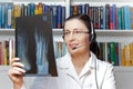 Doctor x-ray foot headset telemedicine Royalty Free Stock Photo