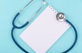 Doctor's Day concept, flat lay top view, stethoscope with peper note diagnosis of heart disease Royalty Free Stock Photo