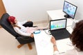 Doctor and young patient during a biofeedback therapy