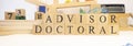 Doctoral advisor was created from wooden cubes. Education and career concept. Royalty Free Stock Photo