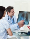 Doctors analyzing an x-ray Royalty Free Stock Photo