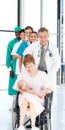 Doctors attending to a patient and her baby Royalty Free Stock Photo