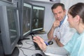 Doctors checking mri machine screens Royalty Free Stock Photo