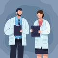 doctors couple with clipboard