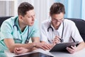 Doctors diagnosing disease on meeting Royalty Free Stock Photo