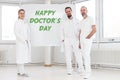 Doctors in front of a whiteboard with the text happy doctor`s da