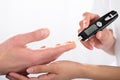 Finger Prick For Glucose Sugar Measuring Level Blood Test Royalty Free Stock Photo