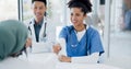 Doctors handshake, welcome and hospital team with applause, onboarding and kindness for new colleagues. Black woman Royalty Free Stock Photo