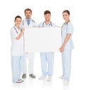 Doctors Holding Placard Royalty Free Stock Photo