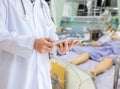 Doctors holding a tablet patients with technology