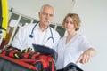 Doctors in hospital with ambulance Royalty Free Stock Photo