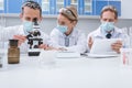 Doctors working with microscope Royalty Free Stock Photo